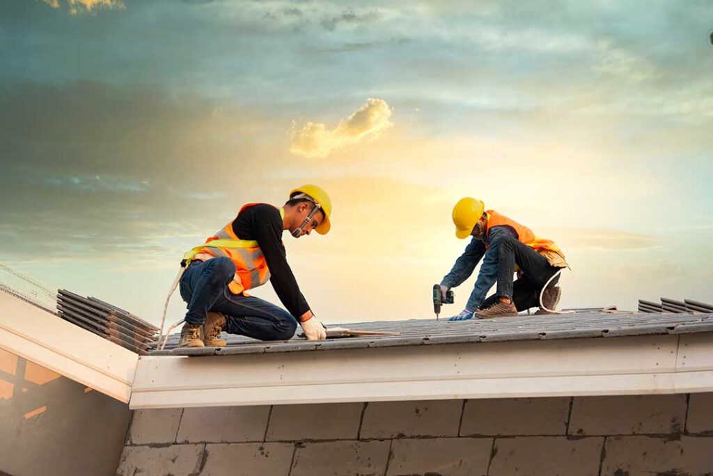 Asphalt shingle roof showing color fading and minor surface wear under bright sunlight